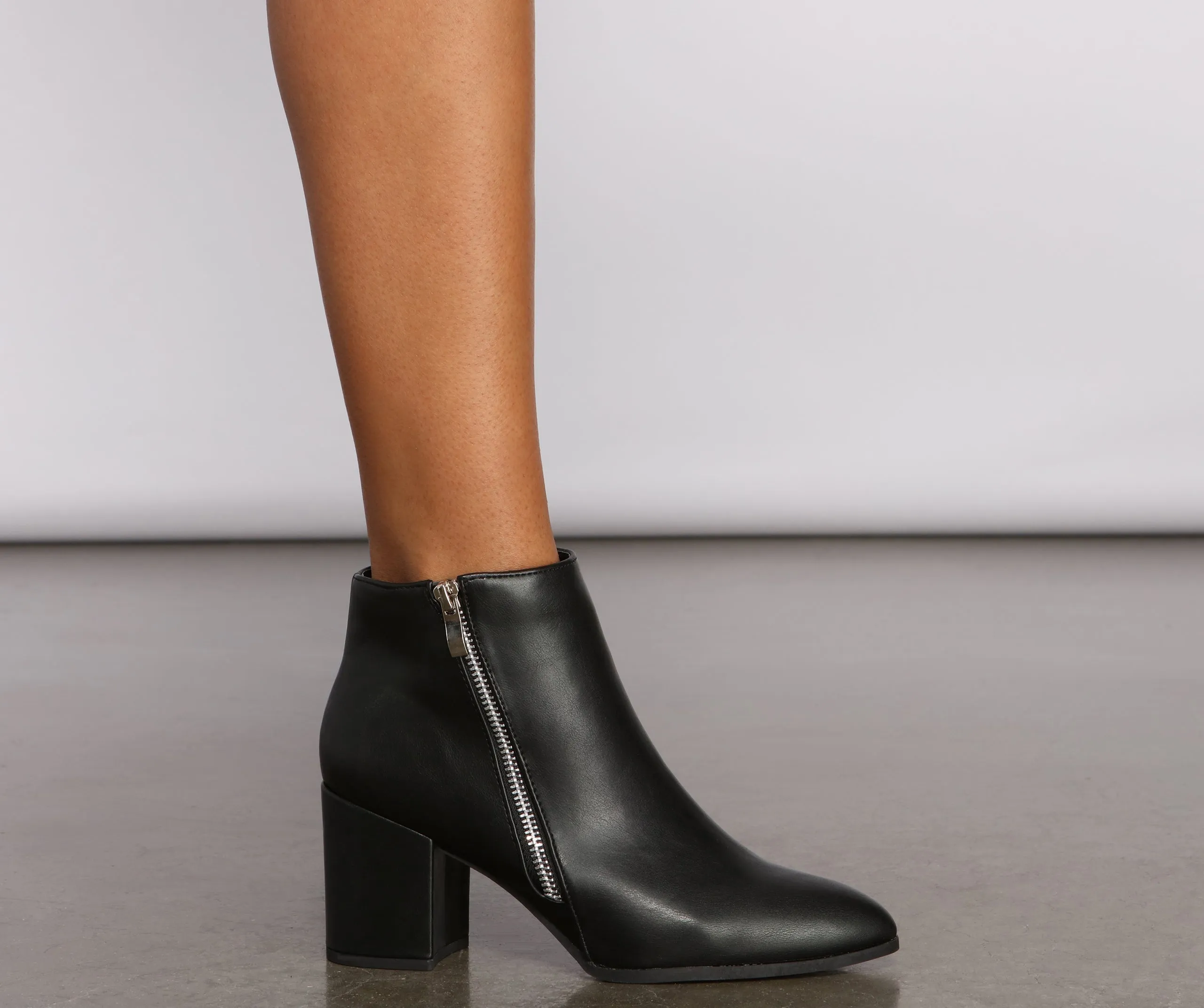 Effortless And Edgy Faux Leather Booties